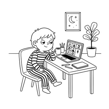 Boy attending online class on laptop at home desk