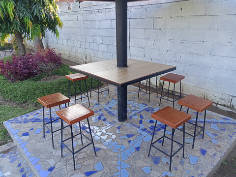 Outdoor Bar Table With Stools In Modern Outdoor Seating Area
