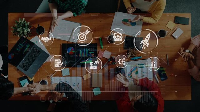Dynamic workspace showcasing a diverse team collaborating on business strategy, highlighted by technology, data, and engaging discussions for impactful results. Raster