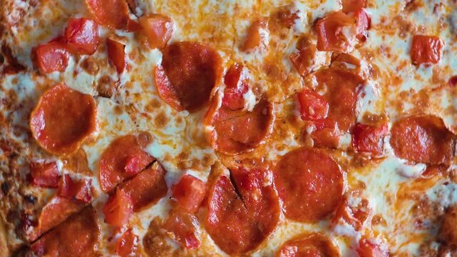 The pizza is topped with crispy pepperoni and diced tomatoes arranged neatly on a golden crust. The multiple angles highlight the delicious toppings and texture of the cheese