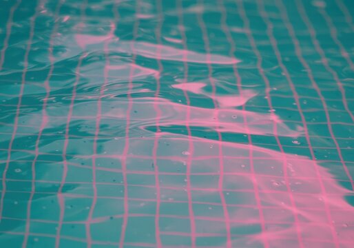 Teal swimming pool water surface reflecting pink caustic light patterns and grid lines for summer lifestyle, creative graphic design and artistic background