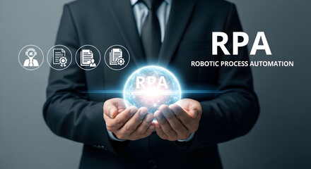 Obraz premium A businessman presenting robotic process automation concept in his hands.