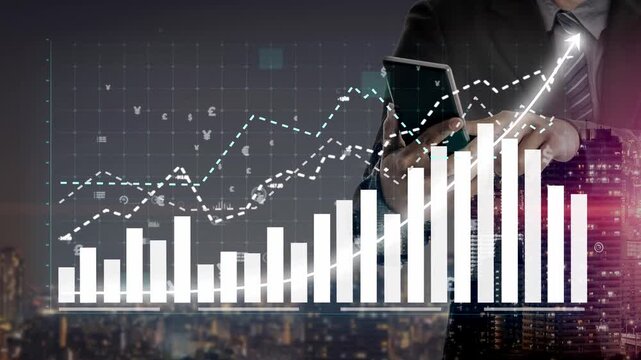 A businessman stands in an urban setting at night, using a smartphone to analyze financial data visualizations displayed with bar charts and graphs, showcasing growth trends. Copula