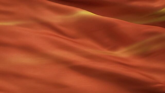 Abstract flowing fabric with warm glowing highlights and shadows