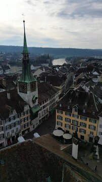 Panoramic view of the Old Town in Solothurn Switzerland Marktplatz, aerial vertical video reel