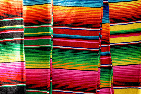Colorful Mexican Blanket in the Mercado 28 souvenirs and handicrafts market in Cancun, Mexico