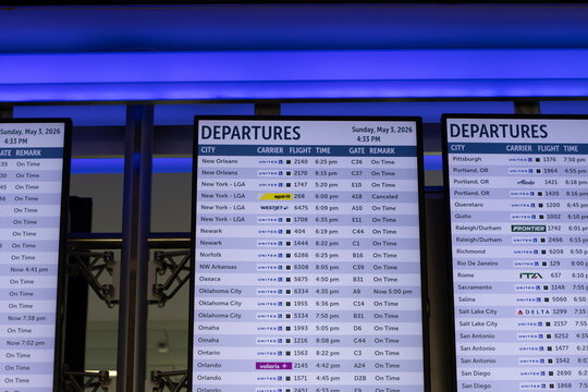 Houston, TX, USA - May 3, 2026: The Spirit Airlines flight NK268 from Houston (IAH) to New York (LGA) is seen canceled on the screen of a departure board at George Bush International Airport.