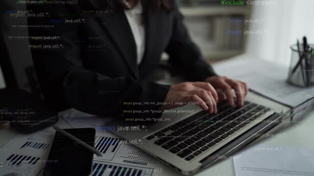 A business professional is focused on coding and data analysis while working on a laptop in a modern office, showcasing the intersection of technology and innovation. Xenic