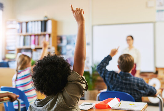 Question, school and children in classroom with hands up for lesson, learning and knowledge. Teacher, academy and students with arm raised for asking, feedback or answer for education and development