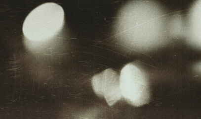 Fototapeta premium Old film texture with scratches, noise and light leaks. Realistic transparent overlay film texture in black-white, dust and grain. Distressed retro movie or photo negative effect of cinema nostalgia