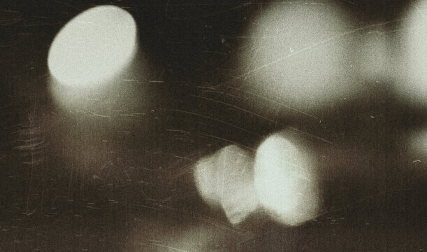 Old film texture with scratches, noise and light leaks. Realistic transparent overlay film texture in black-white, dust and grain. Distressed retro movie or photo negative effect of cinema nostalgia