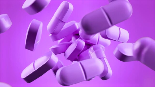 Monochromatic composition featuring various purple pills and capsules falling through a purple space. Suitable for stylized medical backgrounds, abstract health concepts, or pharmaceutical motion grap