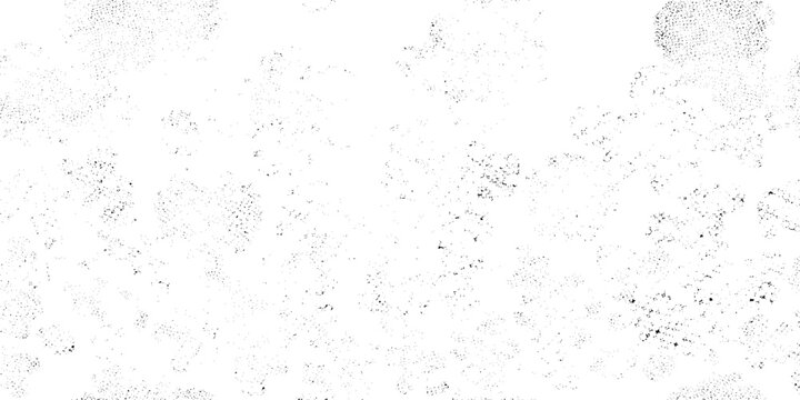 Black and white grunge texture background with scattered dots and smudges