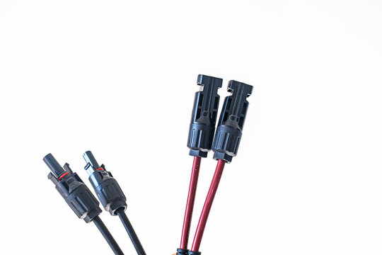 Close-up of 2Y/3Y/4Y solar connectors for parallel connection, 30A, 1000V, photovoltaic sockets for solar panel cables, 2 pcs on the table