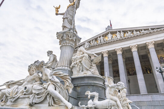 Detailed view of marble sculptures at the Pallas Athene Fountain and Austrian Parliament