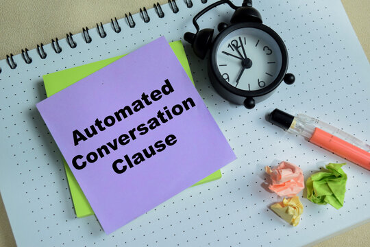 Concept of automated conversation clause write on sticky notes isolated on Wooden Table.