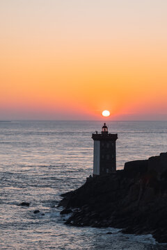 Petit Minou lighthouse on Atlantic Ocean coast at sunset in France