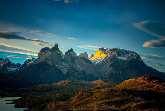 Cuernos del Paine peaks glowing in golden sunset light, Vhile