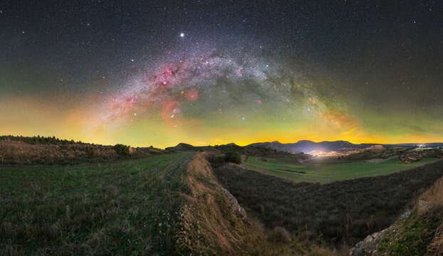 Night Rural Landscape Under Winter Milky Way and Vibrant Green Airglow