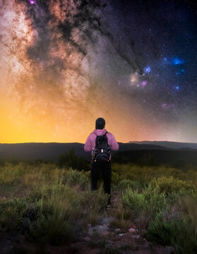 Silhouette of Man Under Starry Sky with Milky Way and Scorpius Region