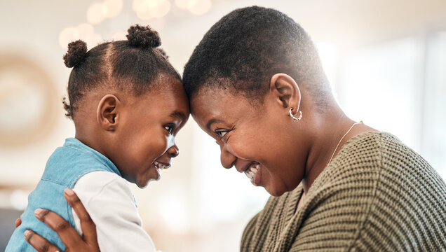 Mom, smile and forehead touch with child, home and black woman with affection for daughter and love. Toddler, growth and happy person with pride for development, care and mother with girl in house