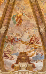Obraz premium CREMA, ITALY - MARCH 20, 2026: The fresco of angels with the Crucifixion instruments (ladder) in cupola of the church Santuario di Santa Maria della Croce by Giacomo Parravicino (1702). 