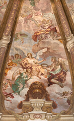 Obraz premium CREMA, ITALY - MARCH 20, 2026: The fresco of angels with the Crucifixion instruments (crown, nails,) in cupola of the church Santuario di Santa Maria della Croce by Giacomo Parravicino (1702). 
