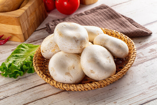 Raw white champignon mush heap