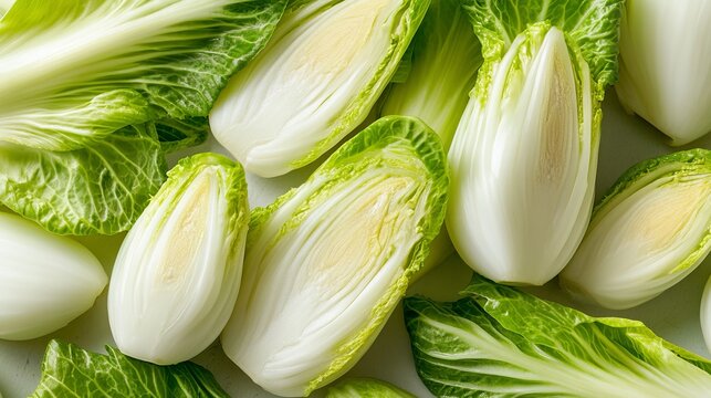 Close-Up Studio Food Still Life of Fresh Belgian Endive Heads and Leaves with Crisp Produce