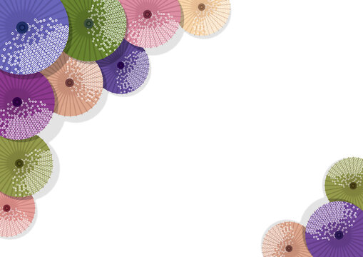 Colorful Japanese umbrellas adorned with traditional patterns overlap.