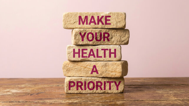 Health priority wellness mental journal stone block stack wooden table pink. Journal wellness mental mindfulness well-being writing relaxation notebook peaceful diary therapy