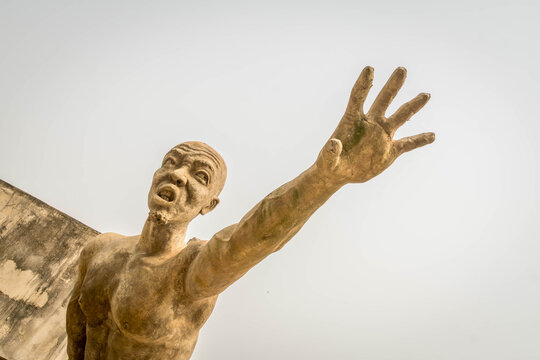 African slaves memorial in Benin town of Ouidah, reminding about tragic history of slave trade and Black history tragedy in West Africa.
