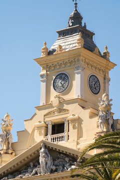 Upper facade Malaga City Hall with sculptures neobaroque architecture Spain