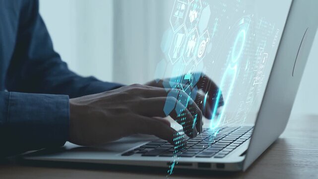 Close-Up of a Person Hands Typing on a Laptop with Digital Interface Elements for Technology and Business Concepts in a Modern Office Setting. Qubit.