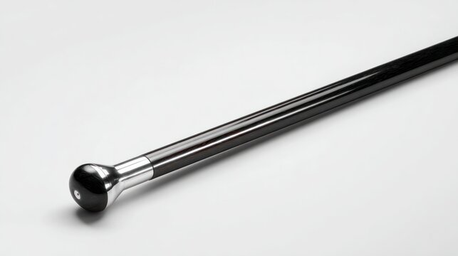 Elegant Walking Cane: A close-up shot of a sophisticated walking cane, featuring a glossy black shaft and a polished knob handle, exuding classic style and timeless functionality.