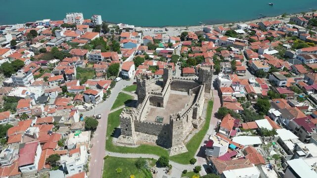 Aerial View of Candarli Castle and Coastal Town at Sunny Day, Izmir, Turkey. High quality 4k footage