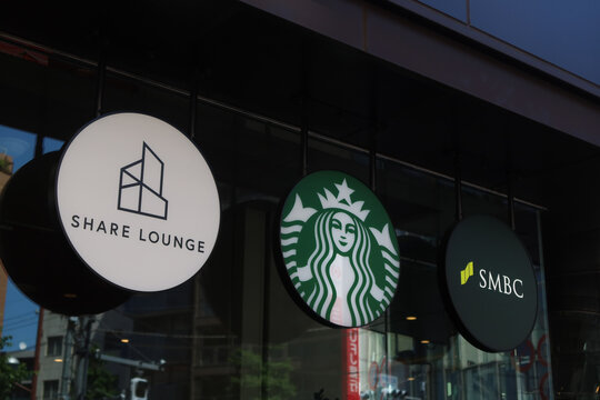 Olive Lounge, Starbucks and SMBC Signage in Meguro, Tokyo, Japan. May 5, 2026