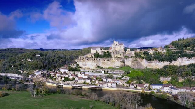 Chateau de Beynac view from green meadows across the river
