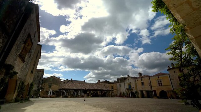 Monpazier Medieval Square Timelapse with Passing Clouds