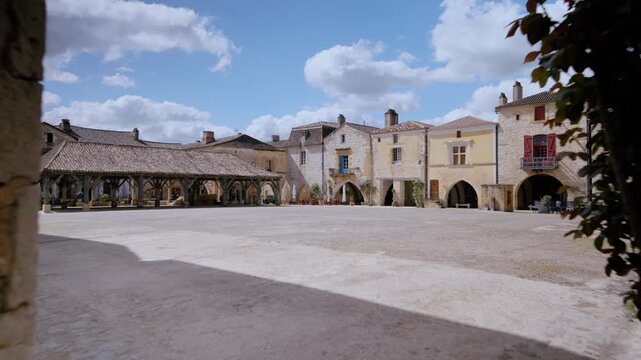 Monpazier Medieval Square View through Stone Archway