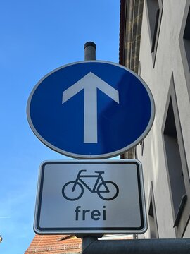 A white arrow sign