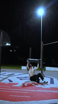 outdoor core training at night during rain 