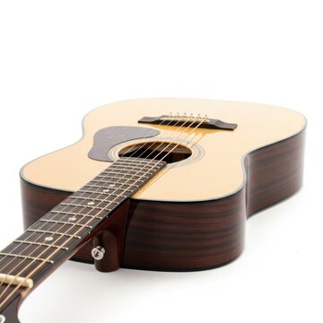 Light beige acoustic guitar with black pickguard and strings