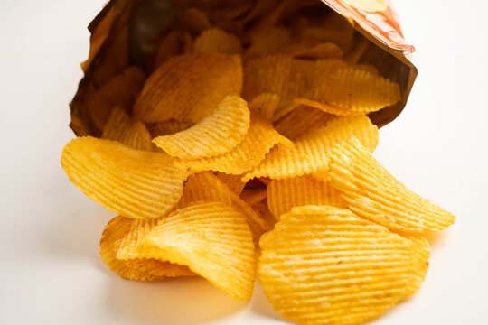 Potato chips delicious BBQ seasoning spicy for crips, thin slice deep fried snack fast food.