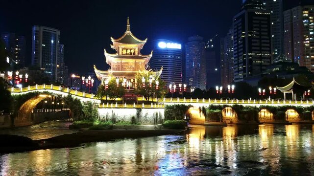Jiaxiu Tower and Nanming River at Night in Guiyang China
