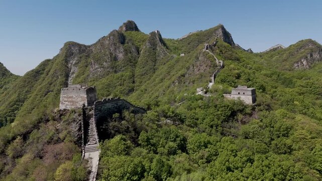 Unrestored Jiankou Great Wall crossing steep mountain peaks and rocky ridges near Beijing, China