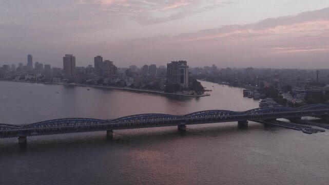 Council of State Building, Cairo, Egypt Nile River and El Galaa Bridge Cinematic Aerial Sunset shot with Drone