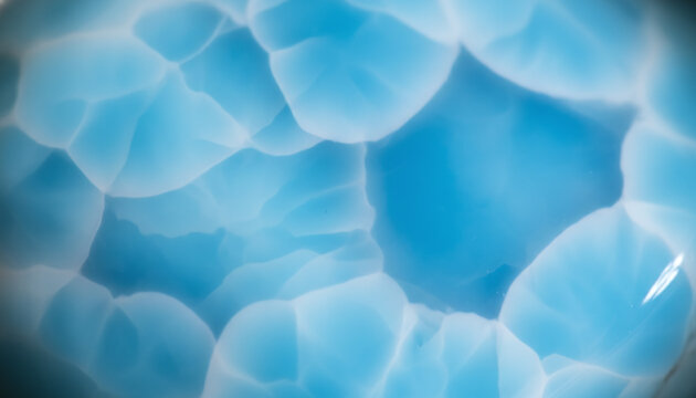 Polished Larimar gemstone texture with blue Caribbean sea water pattern