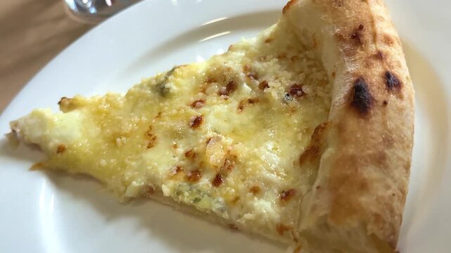 family sharing cheese pizza pulling slices melted cheese close up dining scene 