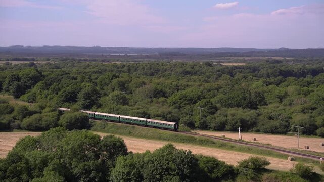 Vintage Heritage Train Passing Through Countryside Near Corfe Castle